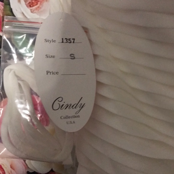 The brand is Cindy Collection. This dress is white, and a size small. - Picture 3 of 3